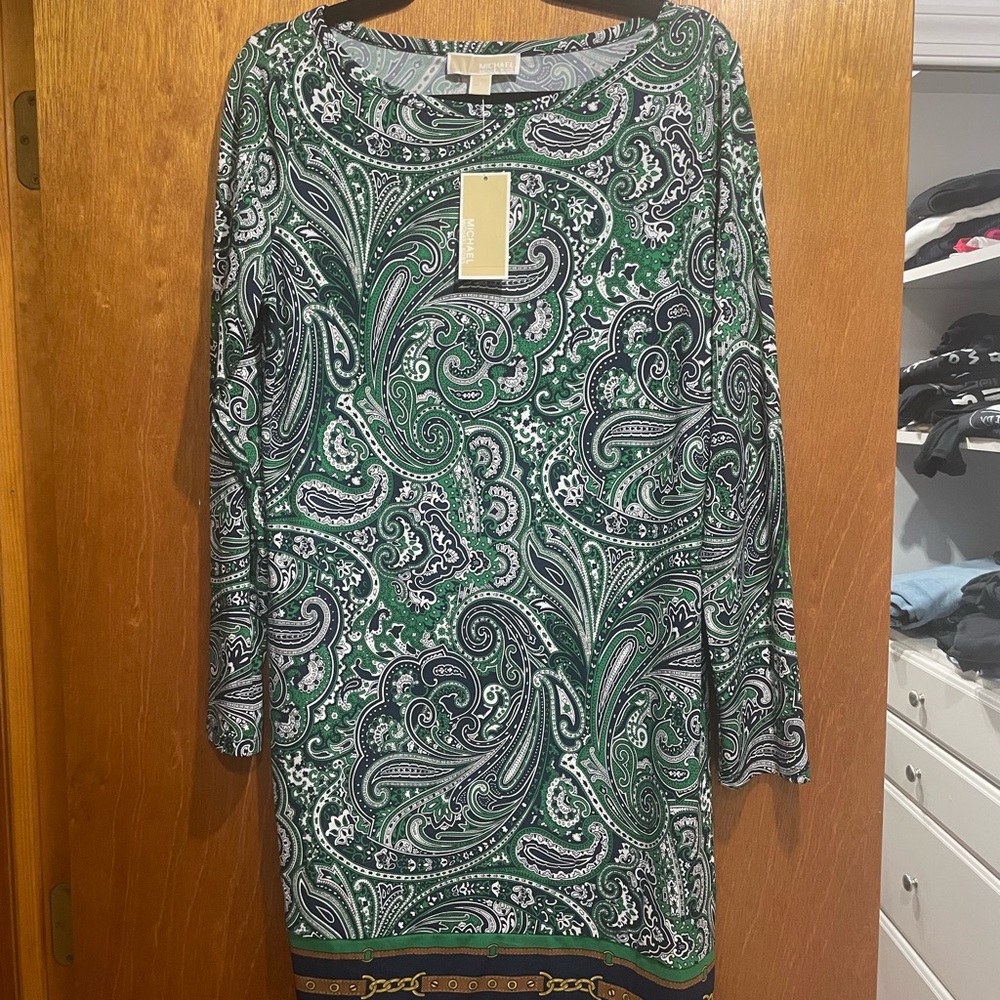 This is a NWT Michael Kors dress.  It is 36 inches in length.   Super cute.